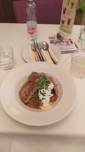 Stuffed cabbage rolls with sausages and seitan at Napfényes Restaurant & Confectionery in Budapest