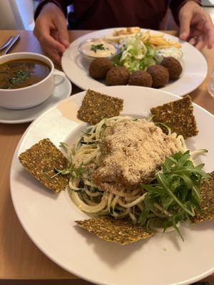 Daily special - Hungarian seaweed soup (meh), raw zucchini bolognese (ok), falafel (tasted like standard falafel, French fries and bagged salad)   at Napfényes Restaurant & Confectionery in Budapest