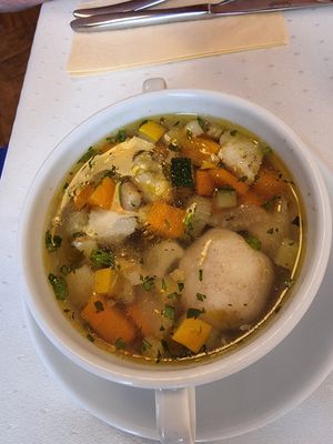 Garden vegetable soup with semolina dumplings at Napfényes Restaurant & Confectionery in Budapest