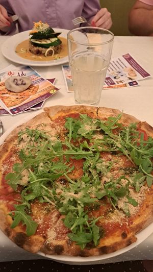 Pizza with pesto and cashew parmesan at Napfényes Restaurant & Confectionery in Budapest
