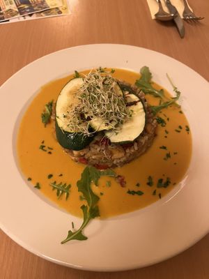 Zucchini on top of quinoa & brown rice  at Napfényes Restaurant & Confectionery in Budapest