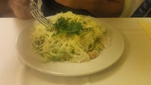 their famous Caesar salad at Napfényes Restaurant & Confectionery in Budapest