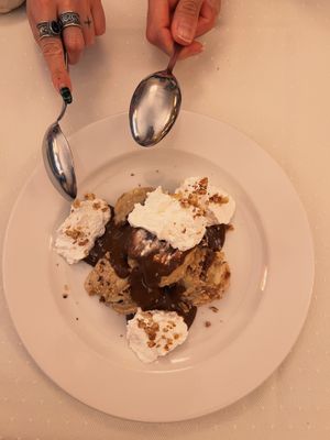 Somlói galuska  at Napfényes Restaurant & Confectionery in Budapest