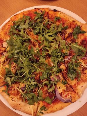 Coal burner pizza with extra ruccola at Napfényes Restaurant & Confectionery in Budapest