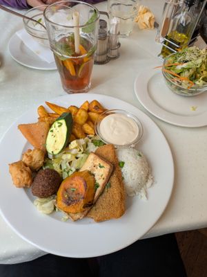 Napfényes Lavish Platter for 1: 3/5. Different types of vegan meat / tofu, sauce, rice and potato and salad. at Napfényes Restaurant & Confectionery in Budapest
