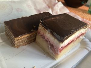 Zserbo (left) and mille feuille with raspberry (right)  at Napfényes Restaurant & Confectionery in Budapest