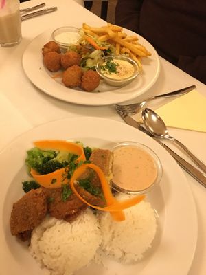 Seitan kiev (front), falafel platter (in the back) at Napfényes Restaurant & Confectionery in Budapest