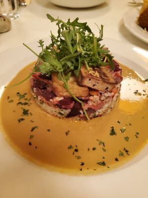 Beetroot risotto with smoked tofu and peanut sauce at Napfényes Restaurant & Confectionery in Budapest