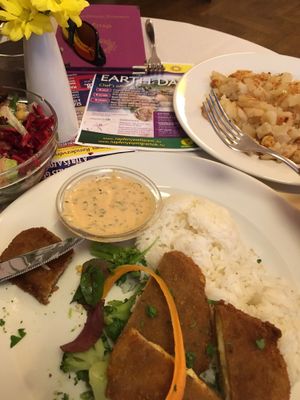 Stuffed breaded seitan kiev with thousands islands dressing; smashed potatoes at Napfényes Restaurant & Confectionery in Budapest