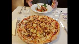 Pizza and stuffed cabbage at Napfényes Restaurant & Confectionery in Budapest