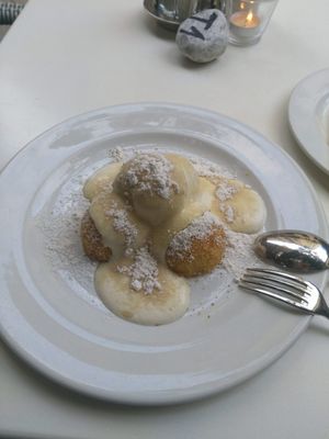 Some traditional dessert with soy yogurt sauce at Napfényes Restaurant & Confectionery in Budapest