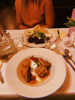 Traditional Hungarian dish + falafel with dipping cream at Napfényes Restaurant & Confectionery in Budapest