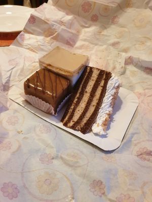 Impossible buy just one cake to takeaway... at Napfényes Restaurant & Confectionery in Budapest