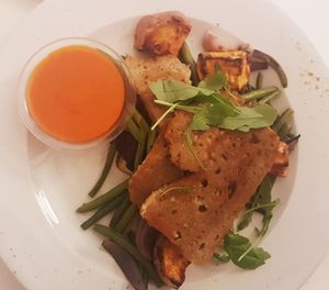 Grill platter with sweet potatoes and roasted red pepper sauce. DELICIOUS!!@ at Napfényes Restaurant & Confectionery in Budapest