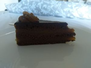 Sacher cake, was takeaway, it was prettier before we took it on the bus ;) at Napfényes Restaurant & Confectionery in Budapest