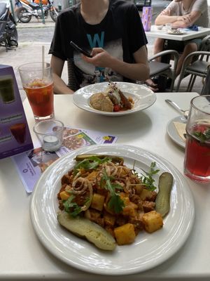 Stuffed cabbage (back) & seitan stew (front) at Napfényes Restaurant & Confectionery in Budapest