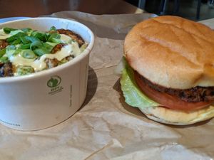 side of fried Brussels sprouts and a Faux Real burger at Planetary Burger in Vancouver