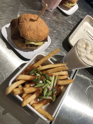 BBQ BacUn Burger, Poutine Fries and vanilla milkshake   at Planetary Burger in Vancouver
