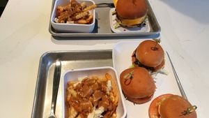 Tasting flight, cheeseburger and poutines at Planetary Burger in Vancouver