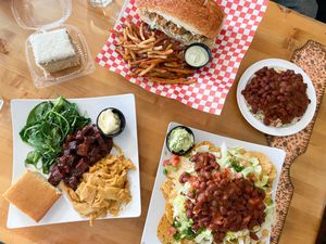 Gator po boy, red beans and rice, creole nachos, coconut cake, and the combo plate with bbq tofu/mac&cheese/braised spinach/cornbread   at Souley Vegan in Oakland