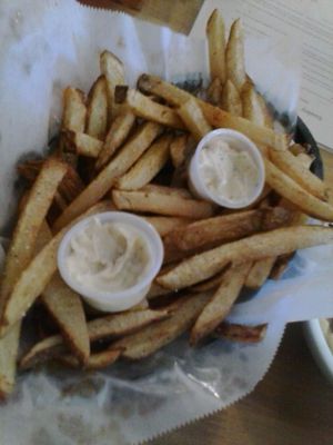 Excellent fries with a definitively delicious garlic sauce to dip 'em in.  

Perfect with the vegan beers... .  !~_^!   at Souley Vegan in Oakland