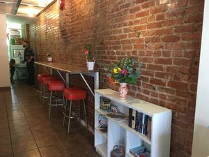 Inside counter seating at Prioritized Pastries in Maplewood