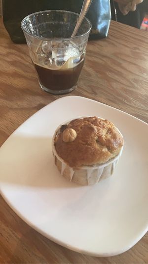 iced americano and vegan banana bread muffin   at Tribeka in Graz