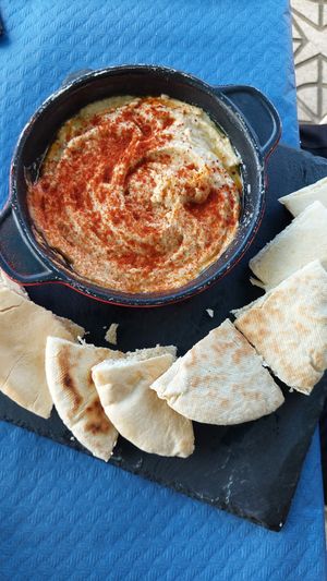 Hummus with pita bread at Campomar in San Vicente De La Barquera