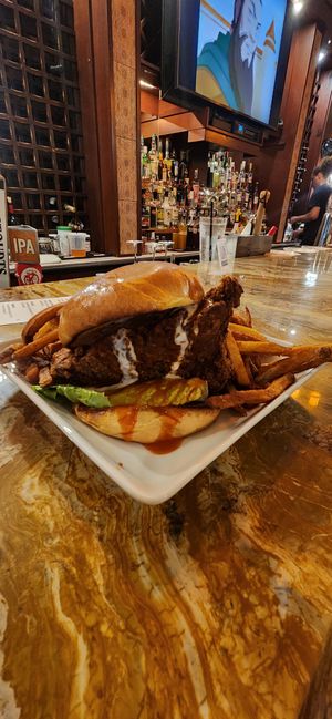 Vegan buffalo seitan sandwich at Queen & Rook Game Cafe in Philadelphia