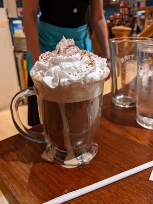 Hot Chocolate! The nice waitress got extra fancy and customized mine with some cinnamon at Queen & Rook Game Cafe in Philadelphia