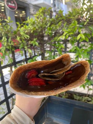 Bitter ION (chocolate) spread with strawberries, in a vegan crepe!  at Navarino Creperie in Thessaloniki