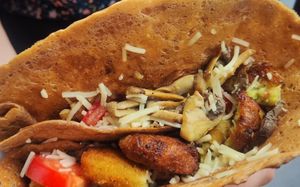 Crepe with vegan cheese, mushrooms, zucchini croquettes, tomato at Navarino Creperie in Thessaloniki