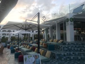 Outside seating overlooking the sea at Ve Cafe in Ibiza