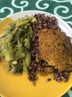 Eggplant dish with marinated tempeh and riceberry  at Vegan Kon Cook - Reach in Phuket