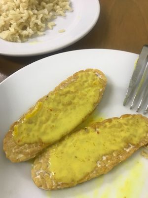 Tempeh with sauce from the pumpkin curry at Vegan Kon Cook - Reach in Phuket