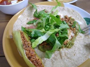 Tasty taco with a whole jalapeño pepper stuffed with finrly diced mushrooms snd banana blossom. So delicious. at Vegan Kon Cook - Reach in Phuket