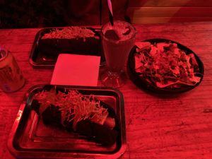 Hot dogs, nachos, and oreo milkshake  at Café León in Bogota