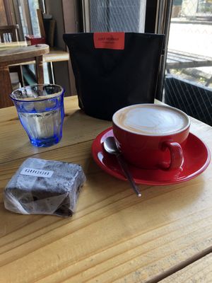 Beans, vegan brownie, oat milk coffee at Dark Arts Coffee in Hayama