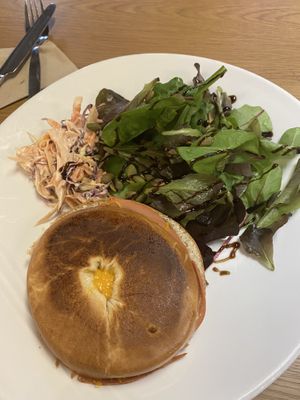 Vegan ham and cheese bagel with coleslaw and salad :) at Cantina in Penryn