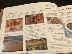 Orange V symbol means can be made vegan at Status in Auckland