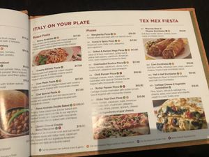 Orange V symbol means can be made vegan at Status in Auckland