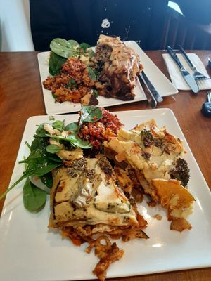 Lasagne and enchilada with salad at 1Two1 Vegan Café in Springwood