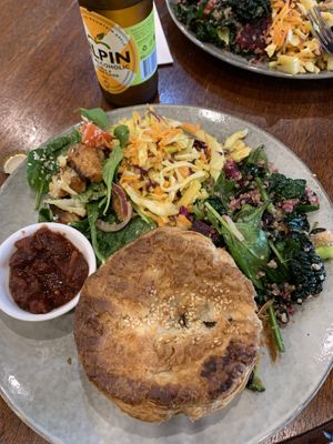 Cheezy pie and salad. Completely hit the spot for a late lunch. Warmer in a pie warmer so beautiful crisp pastry    at 1Two1 Vegan Café in Springwood