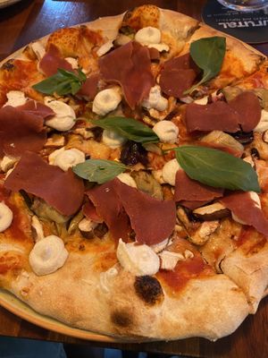 The delicious capricciosa pizza! at Blu Bar in Barcelona