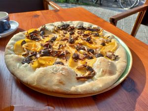 Yummy but too many parts of the pizza without topping! at Blu Bar in Barcelona