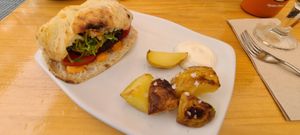 Veggie burger with potatoes at Blu Bar in Barcelona