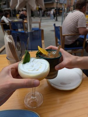 Cocktail with passion fruit and coconut cream and a tikki-style spritz, with passion fruit, pineapple & lemon. at Blu Bar in Barcelona