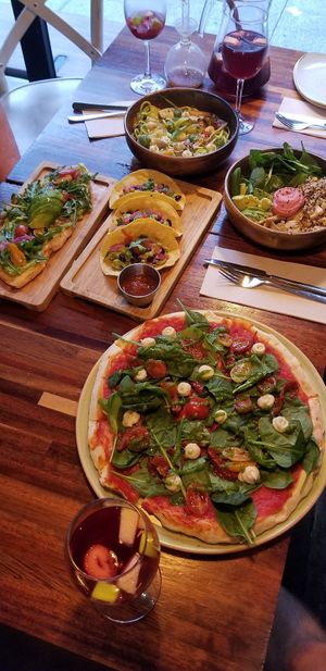 Popeye pizza, tacos, avocado bread, buddha bowl, zucchini spaghetti. at Blu Bar in Barcelona