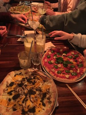 I had the mushroom truffle, next to me the margarita and the mexican in the back   at Blu Bar in Barcelona