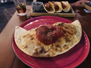 The best calzone ever! 🖤 at Blu Bar in Barcelona
